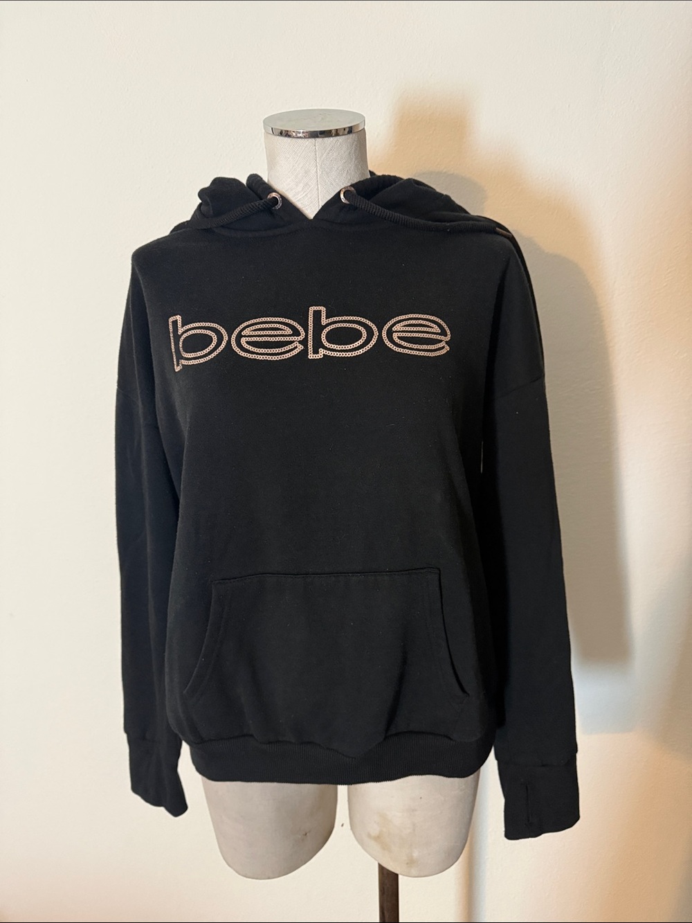 bebe Black Hoodie with Rose Gold Logo front pocket thumb holes M